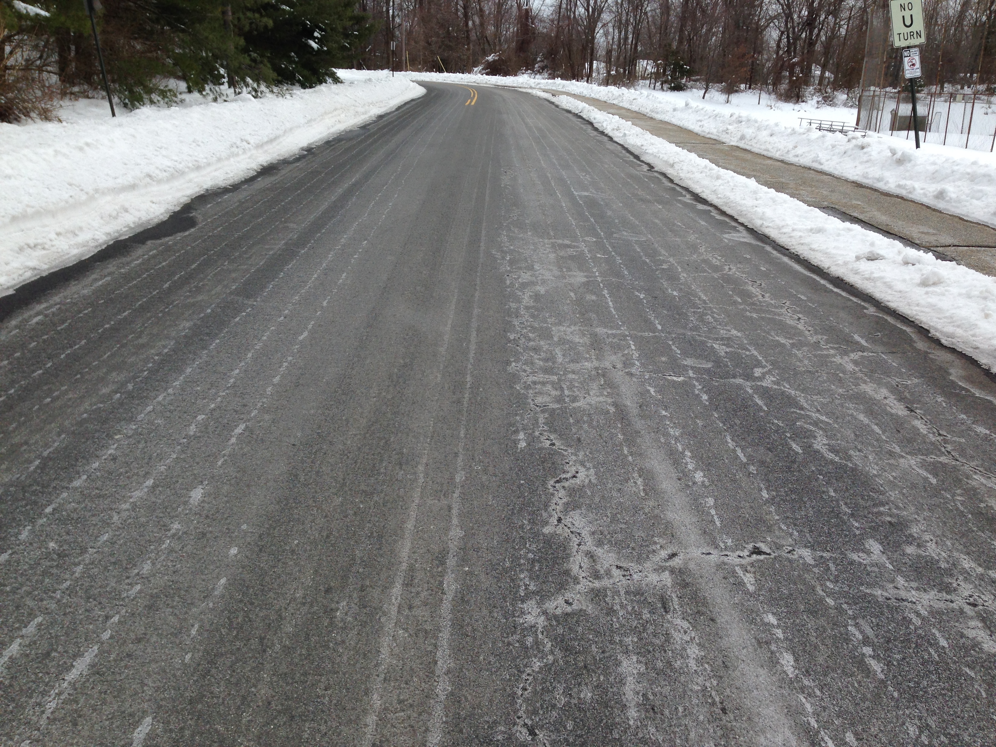 Winter road treated with liquid brine